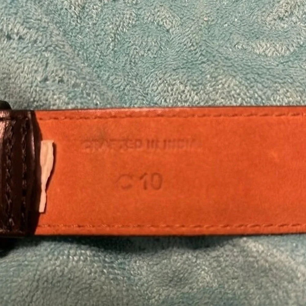 Cole Haan Leather Black Belt men's Size 34. Buckle is solid brass. Good Preowned